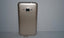 Tapa Samsung Galaxy J1 (2016) J120 - Dorada con Marco