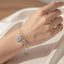 Pulsera Poderosa Doble Corazon y Llave Plateado