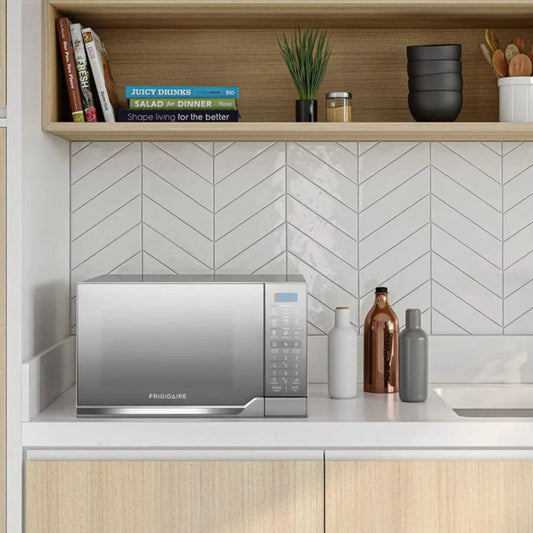Frigidaire microondas 900W 0.9 ft FMDO25S3GSPG
