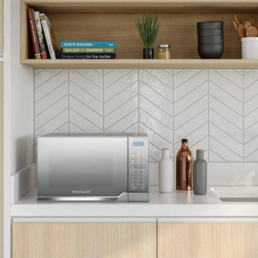 Frigidaire microondas 900W 0.9 ft FMDO25S3GSPG